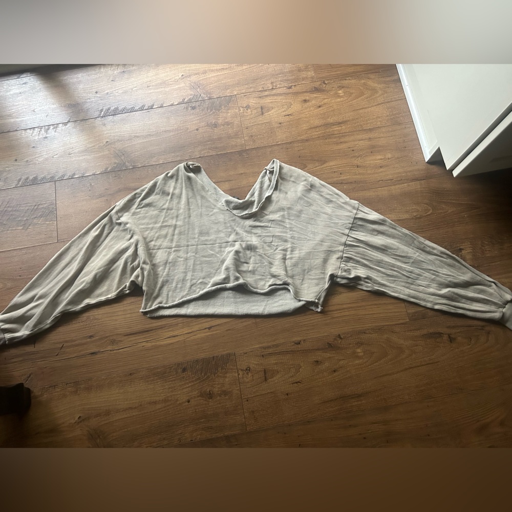 Cropped, cut neck shirt